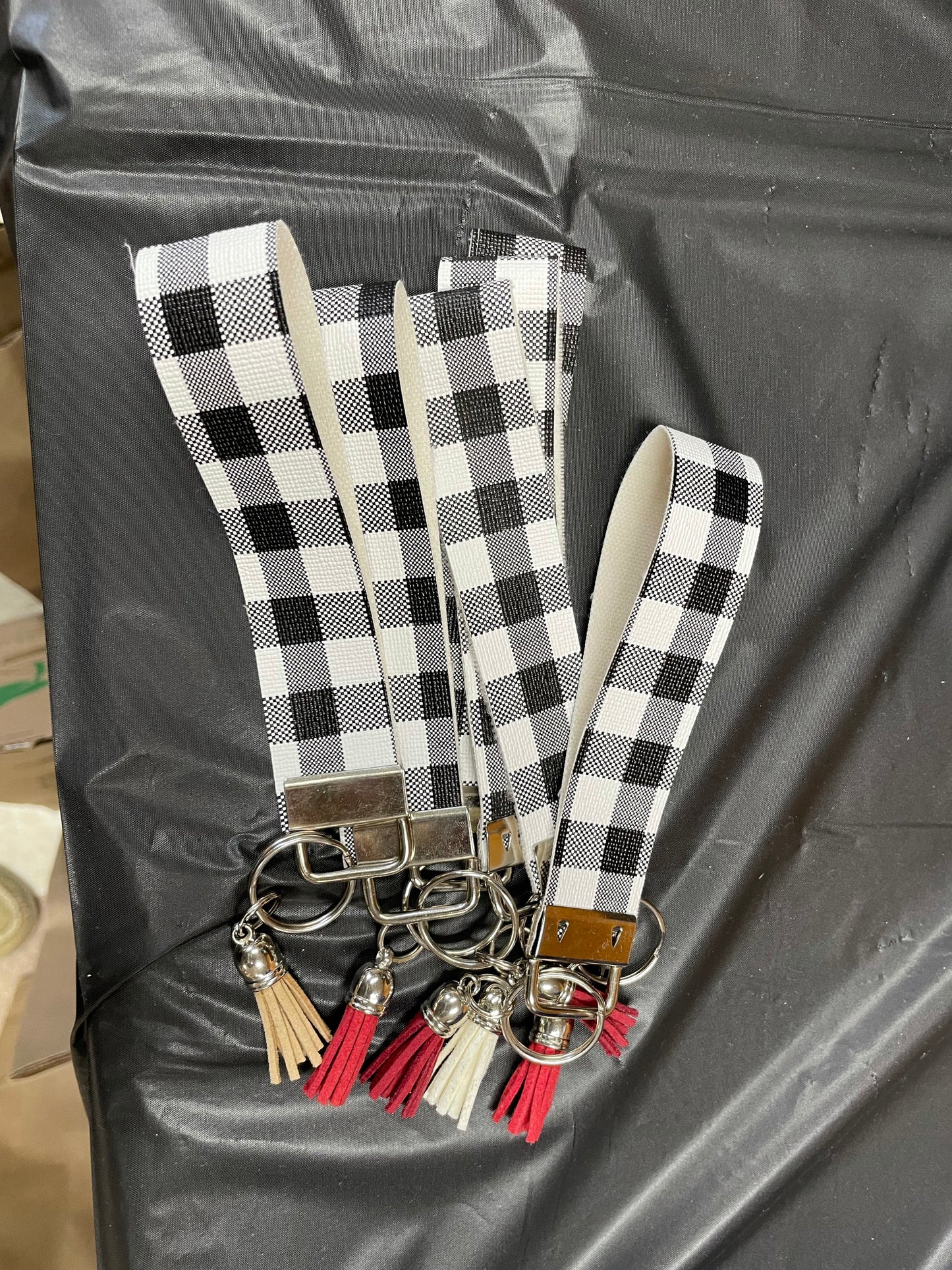 White and black Check key wristlet