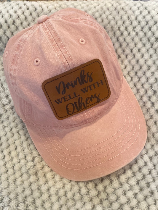 DRINKS WELL WITH OTHERS-HAT